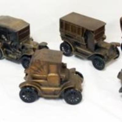 1107	GROUP OF ASSORTED CAST METAL CAR AND RELATED BANKS
