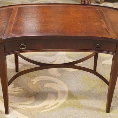 1273	MAHOGANY KIDNEY SHAPED LEATHER TOP COFFEE TABLE WITH 1 DRAWER, APPROXIMATELY 35 IN X 18 IN X 19 IN H
