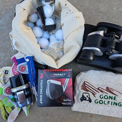 Lot #324 - Ballfinder Scout, Titleist & Other Golf Balls, Golf Gloves, Bosch-Optikon Binoculars, Impact Improver, & Rock Sign