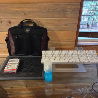 Lot #123 - Laptop Bag, Apple Wireless Keyboard, Screen Cleaner, Desk Stands, Jawbreakers Earbuds