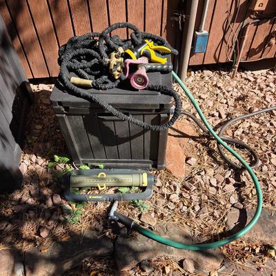 Lot #256 - Hose Reel, Hoses, Sprinkler Attachment and Various Nozzles