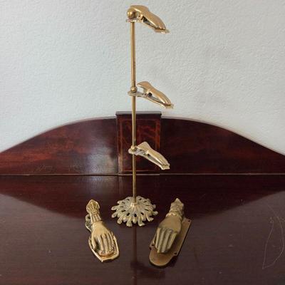 Lot #173 - Victorian Brass Glove Clip Stand With A Hand Letter Clip and Door Knocker