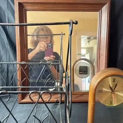 Lot  108:  Vintage Home Décor Lot – Mirror, Wooden Mantel Clock, Metal Rack, and Glass Vase