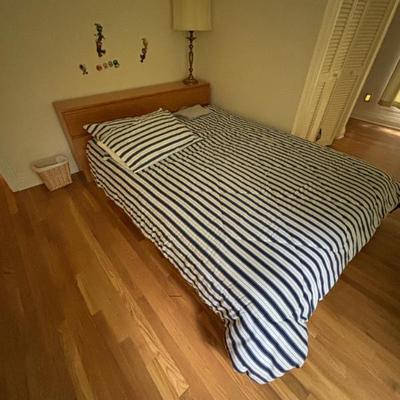 Queen size bed with drawer below   $200