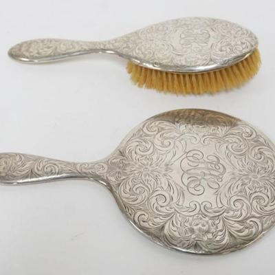 1191	STERLING SILVER LADIES DRESSER MIRROR AND HAIR BRUSH
