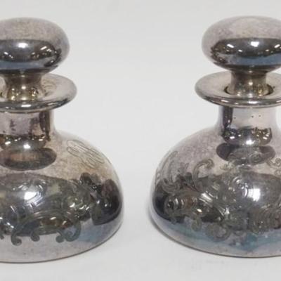 1158	PAIR OF ANTIQUE 999 SILVER OVERLAY TOOLED PERFUME BOTTLES, EACH APPROXIMATELY 3 1/2 IN H
