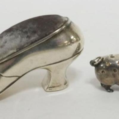 1221	STERLING SILVER SHOE AND PIG PIN CUSHION, 3.4 OZT TOTAL WEIGHT

