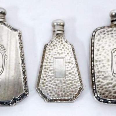 1181	3 STERLING SILVER SCENT PERFUME BOTTLES, TALLEST APPROXIMATELY 2 IN
