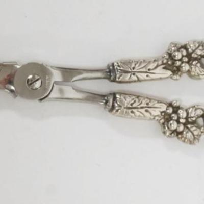 1202	STERLING HANDLED GRAPE SHEARS APPROXIMATELY 8 IN LONG, MARKED ITALY
