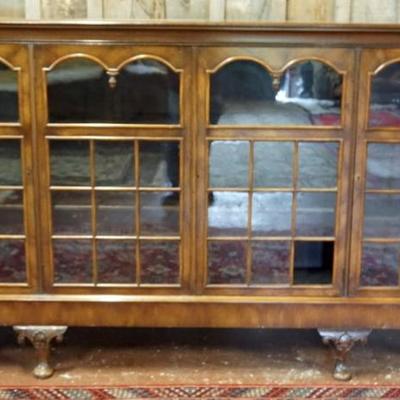 1248	WALNUT 4 DOOR BOOKCASE WITH REEDED STOP CHAMFERED SIDES, INDIVIDUALIZED GLASS PANE DOORS, ADJUSTABLE INTERIOR SHELVES, APPROXIMATELY...