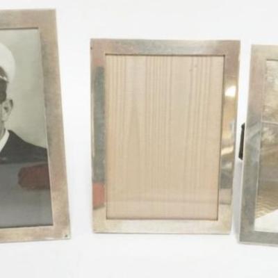 1231	3 STERLING SILVER FRAMES, LARGEST APPROXIMATELY 5 1/4 IN X 7 1/2 IN, 2 MARKED J.E. CADWELL & CO.
