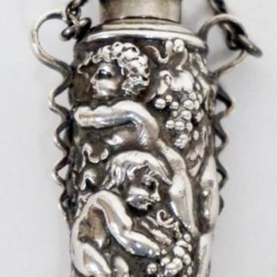 1182	TIFFANY & CO. REPOUSSE STERLING SILVER LADIES SCENT PERFUME BOTTLE WITH IMAGES OF PUTTIS
