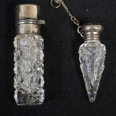 1179	2 STERLIN SILVER AND CUT GLASS LADIES SCENT PERFUME BOTTLES, TALLEST APPROXIMATELY 2 3/4 IN
