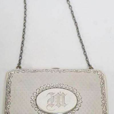 1187	LADIES STERLING SILVER COIN PURSE, APPROXIMATELY 3 IN X 4 IN
