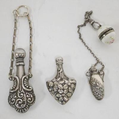 1184	3 REPOUSSE SILVER LADIES SCENT PERFUMES, 1 WITH ENAMEL PIN CLASP, LARGEST APPROXIMATELY 2 1/4 IN
