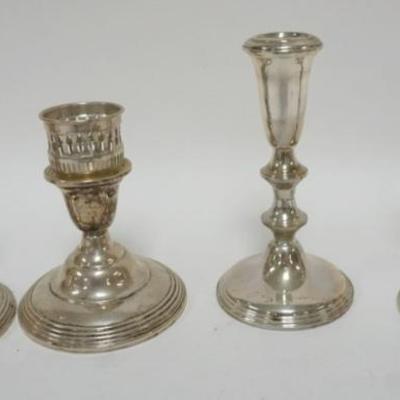 1238	WEIGHTED STERLING SILVER CANDLESTICKS, LARGEST APPROXIMATELY 7 IN H
