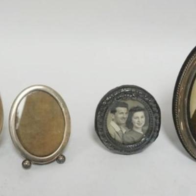 1235	GROUP OF 4 SILVER AND STERLING SILVER FRAMES, LARGEST APPROXIMATELY 6 IN X 4 IN
