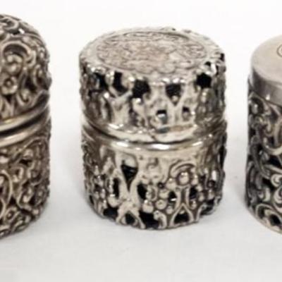 1219	3 STERLING THIMBLE HOLDERS WITH THIMBLES, 1.4 OZT TOTAL WEIGHT
