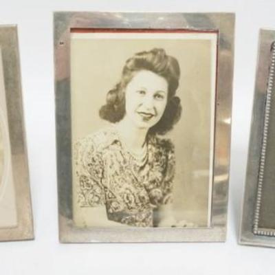 1234	GROUP OF 3 STERLING SILVER FRAMES, 2 MARKED GORHAM AND REED & BARTON, LARGEST APPROXIMATELY 6 IN X 8 IN
