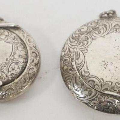 1195	2 STERLING SILVER LADIES LOCKET COMPACTS WITH MIRRORS, LARGEST APPROXIMATELY 2 1/2 IN
