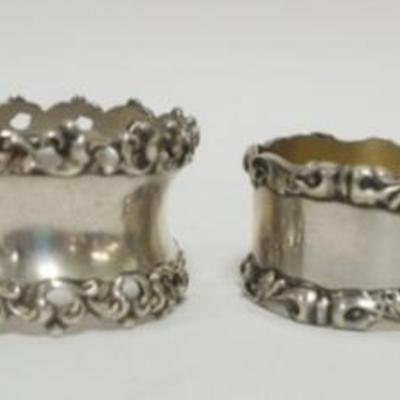 1205	GROUP OF 4 STERLING NAPKIN RINGS, 3.8 OZT

