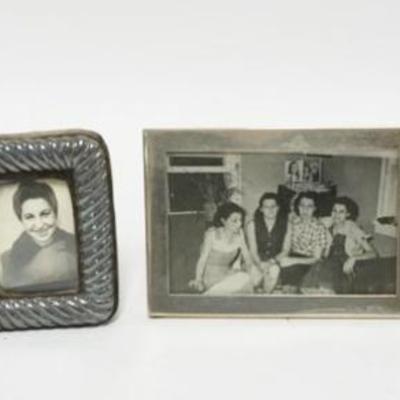 1232	GROUP OF 4 SILVER & STERLING SILVER FRAMES, LARGEST APPROXIMATELY 3 1/2 IN X 5 IN
