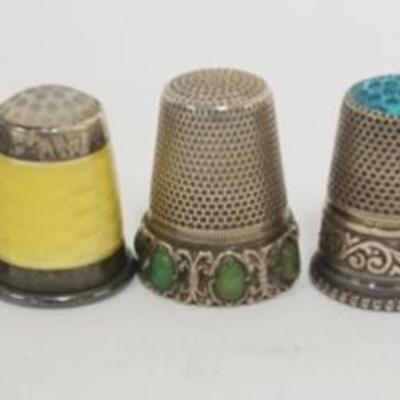 1218	7 STERLING THIMBLES, 1.1 OZT TOTAL WEIGHT
