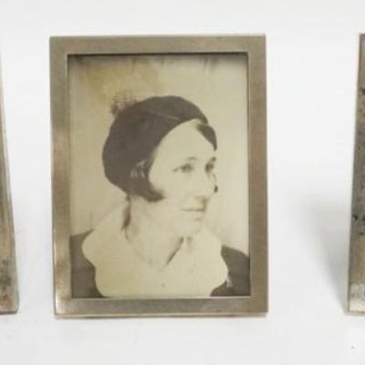 1230	3 STERLING SILVER FRAMES, LARGEST APPROXIMATELY 3 1/2 IN X 4 3/4 IN
