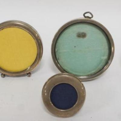 1233	GROUP OF 5 STERING SILVER FRAMES, 2 MARKED EMPIRE, LULLABY, LARGEST APPROXIMATELY 4 IN
