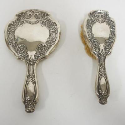 1192	STERLING SILVER LADIES DRESSER MIRROR AND HAIR BRUSH
