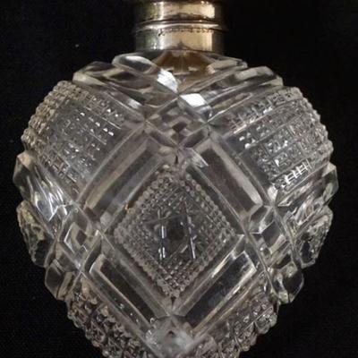 1172	HEART SHAPED CUT GLASS AND REPOUSSE STERLING LID LADIES SCENT PERFUME BOTTLE APPROXIMATELY 4 IN
