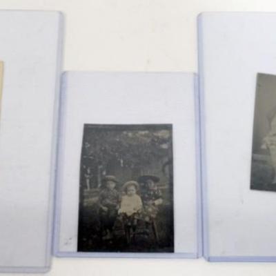 1120	3 TIN TYPES OF CHILDREN, LARGEST APPROXIMATELY 3 3/4 IN X 2 1/2 IN

