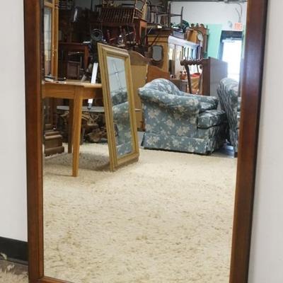 1218	BEVELED EDGE MIRROR IN WALNUT FRAME, APPROXIMATELY 32 IN X 48 IN
