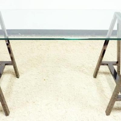 1210	MODERN GLASS TOP WORK SURFACE WITH 2 SAW HORSE METAL MIRROR FINISH LEGS, APPROXIMATELY 60 IN X 28 IN X 30 IN H
