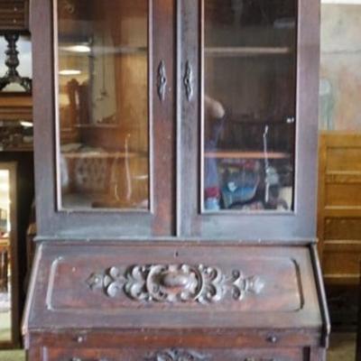 1225	ANTIQUE VICTORIAN 2 PART SECRETARY DESK WITH CARVED PULLS, APPROXIMATELY 44 IN X 21 IN X 101 IN H, TOP RIGHT PIECE OF MOLDING MISSING
