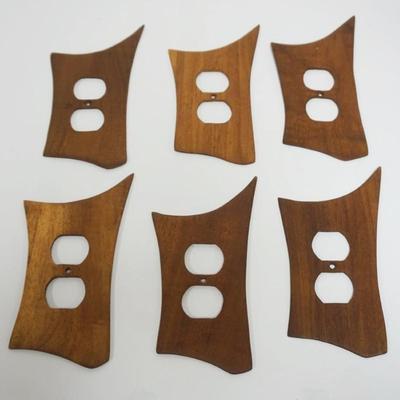 1120	6 VINTAGE UNUSUAL MIDCENTURY MODERN STREAMLINE TEAK DUPLEX WALL SOCKETS PLATE COVERS, EACH APPROXIMATELY 8 IN X 3 1/4 IN
