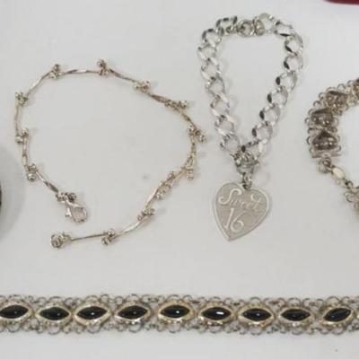 1177	5 STERLING SILVER BRACELETS, 1.18 OZT INCLUDING STONES
