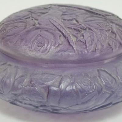 1123	CONSOLIDATED GLASS EMBOSSED AMETHYST COLORED COVERED DRESSER BOX, WITH IMAGES OF BIRDS AND FLOWERS, APPROXIMATELY 7 IN X 4 IN H
