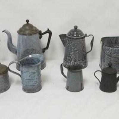 1135	LARGE GROUP OF ASSORTED ENAMELWARE INCLUDING COFFEE POTS, GROWLER, PAIL, ETC., LARGEST PIECE APPROXIMATELY 12 IN H
