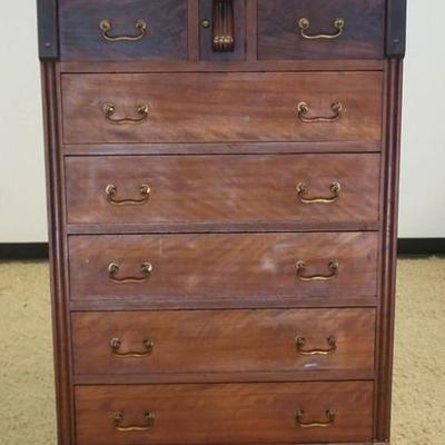 1221	UNUSUAL ANTIQUE FLAME MAHOGANY 7 DRAWER CHEST WITH BRASS GALLERY TOP AND CENTER DOOR, APPROXIMATELY 33 IN X 19 IN X 63 IN H
