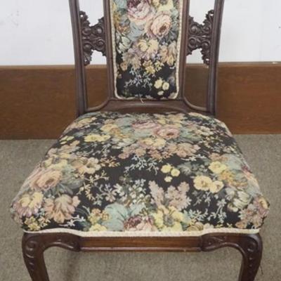 1251	VICTORIAN WALNUT UPHOLSTERED PARLOR CHAIR WITH CARVED HEADS AND NORTH WIND FACE AT SIDES AND CENTER, APPROXIMATELY 23 IN X 21 IN X...