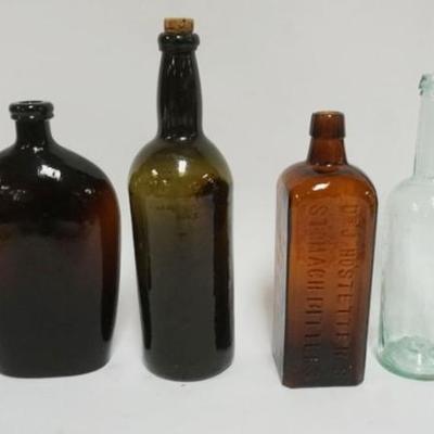 1127	GROUP OF ANTIQUE BOTTLES INCLUDING DR. HOSTETTER'S STOMACH BITTERS, LARGEST APPROXIMATELY 12 IN H
