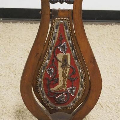 1243	ANTIQUE WALNUT BOOK JACK W/CLOTH & BEADED CENTER PANEL, APPROXIMATELY 13 IN X 17 IN X 31 IN HIGH
