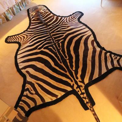 Zebra hide rug