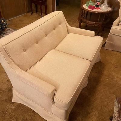 This is the more accurate reflection of color for the sofa and the loveseat.
