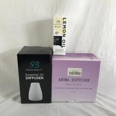Essential Oil Diffusers & Radha Beauty Lemon Oil Lot