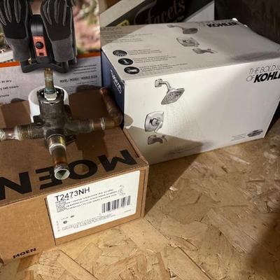 Kohler Shower System and Moen T2473NH Genta LX tub and shower trim kit in chrome finish, featuring a Posi-Temp pressure balancing valve...