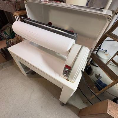  vintage Speed Queen ironer (rotary iron) and its "How To" manual, likely from the 1950s