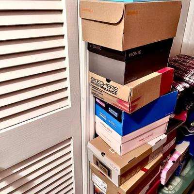 Many many brand new shoes in boxes 