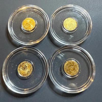 Lot: (4) 1/200 oz Monarch Egyptian Scarab Gold Round